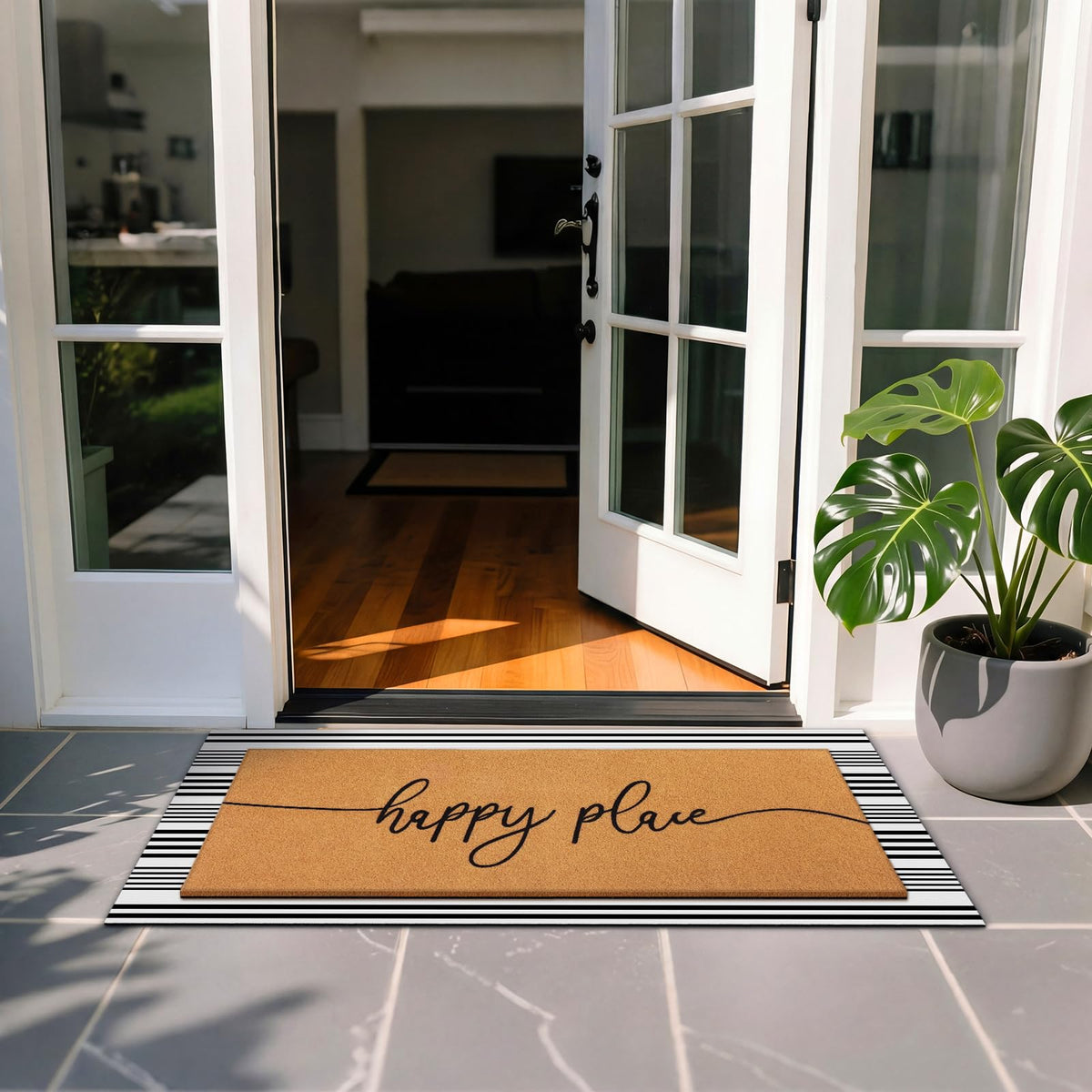 Tinideya Happy Place door mat with black and white stripes for bold curb appeal.
