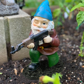 Tirifer garden gnome with gun for outdoor decor and playful vibe