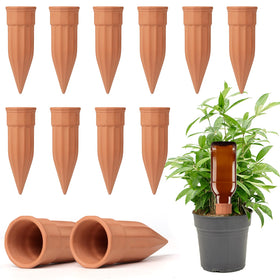TKSCUSR watering spike terracotta setup in a potted plant for steady moisture.