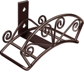 TomCare bronze wall-mount hose holder on a garden wall