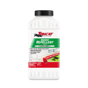 Tomcat Repellents granules spread on turf to deter outdoor rodents.