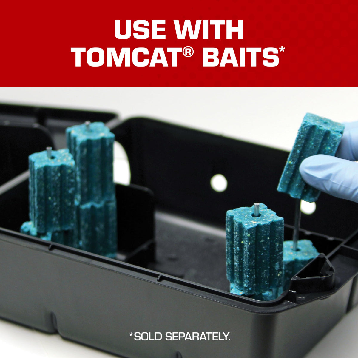 Tomcat Rodent Station placed indoors in a garage for convenient access