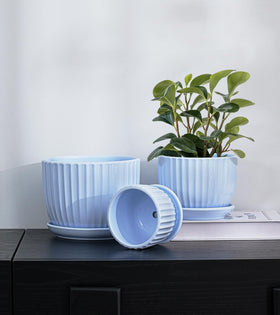 Ton Sin Sky Blue set includes saucers and drainage to protect surfaces