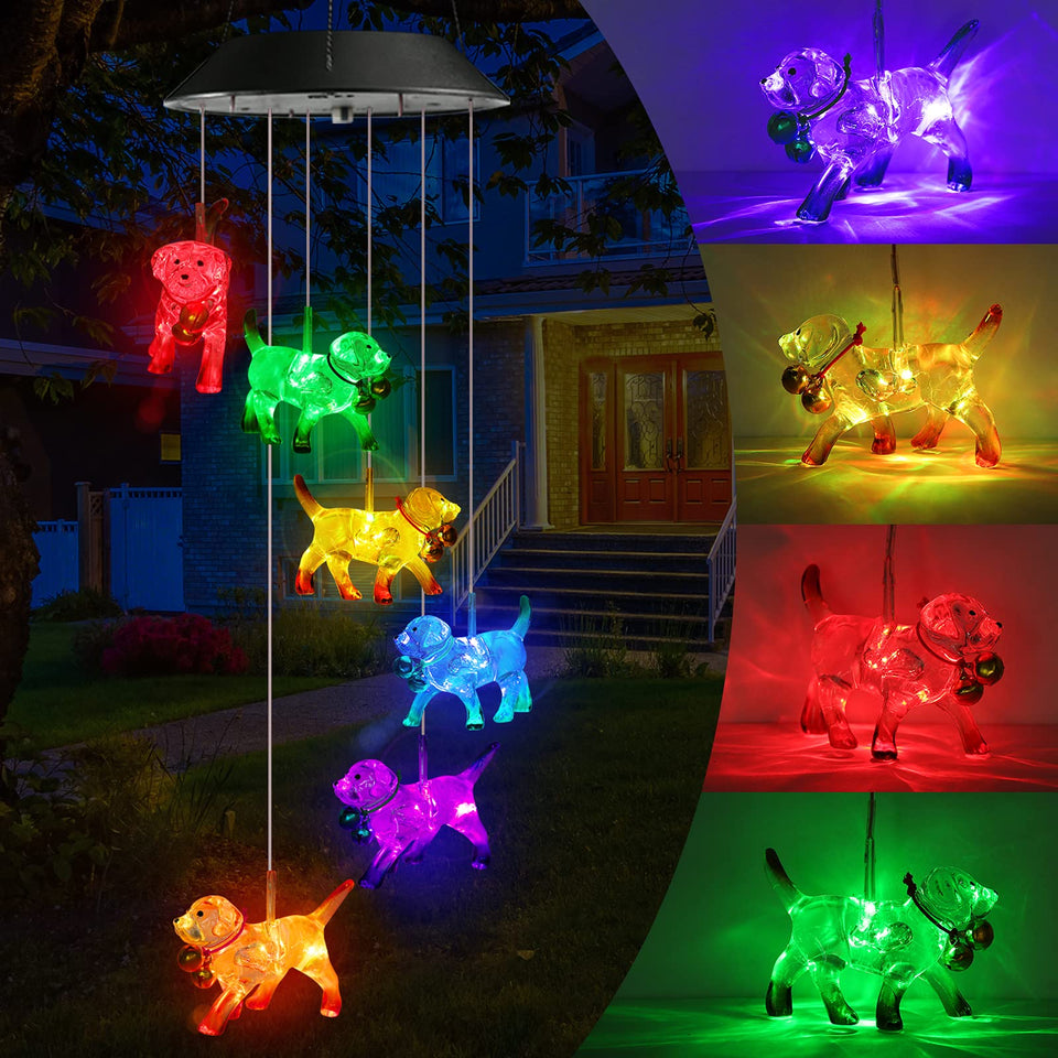 Toodour solar wind chime with dog figures glows at night for garden ambiance.