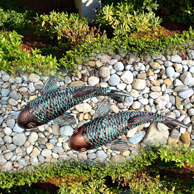 Tooyuart bronze koi fish garden sculpture set of 2 shown outdoors.