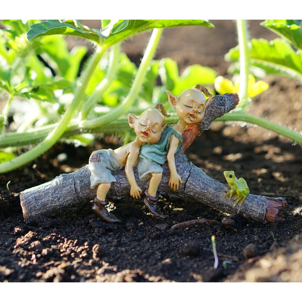 Top Collection tiny twin garden pixies resting on a log enhances terrarium displays.