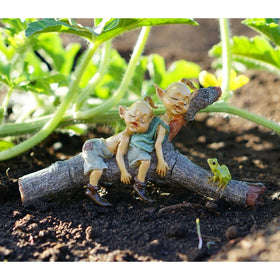 Top Collection tiny twin garden pixies resting on a log enhances terrarium displays.