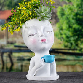 Toparad Face Pot tray catches excess water for floors.