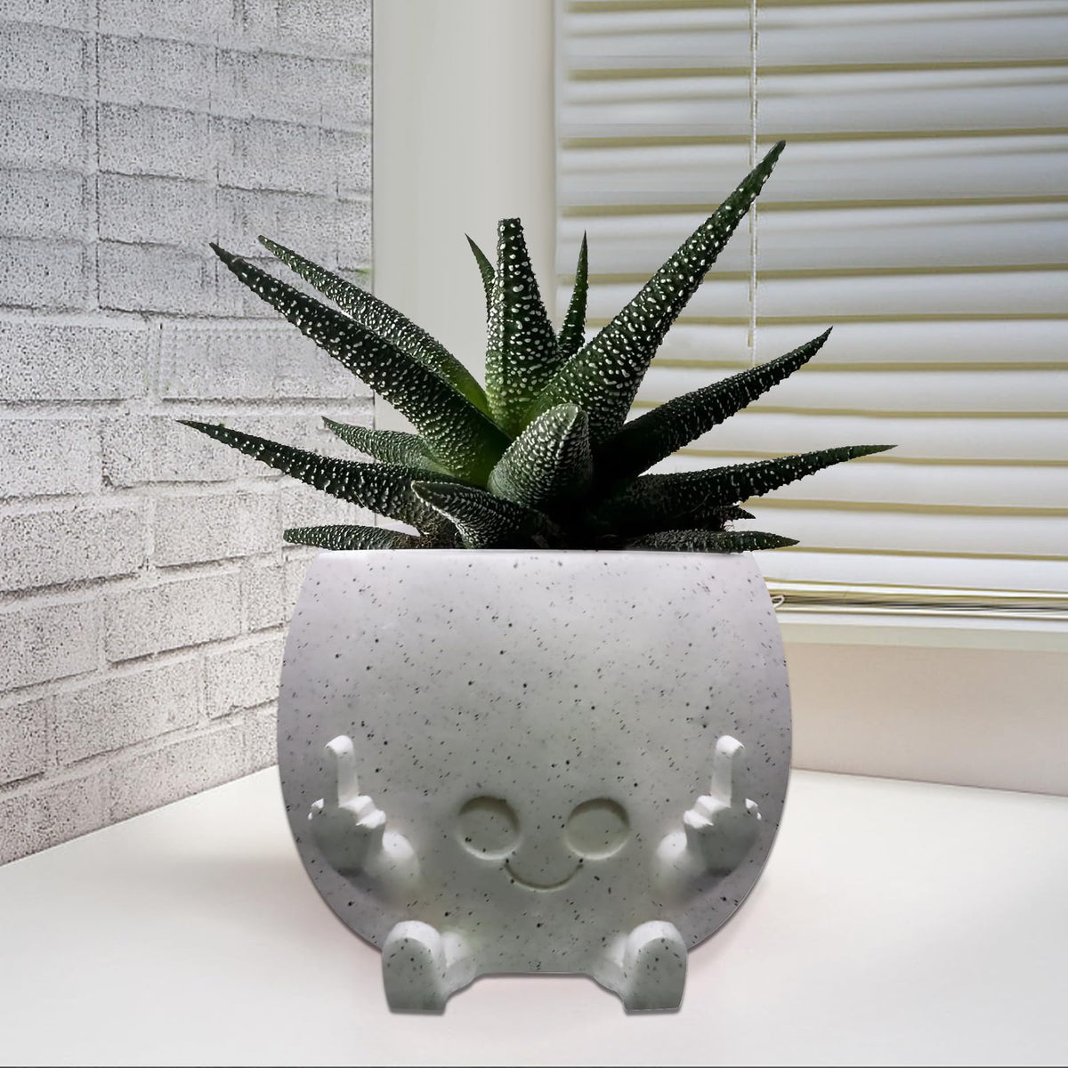 Toparad resin plant pot suitable for indoor and outdoor spaces.