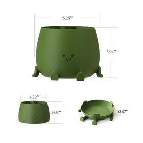 Topola Happy Face Planter indoors on a windowsill adds whimsy and greenery
