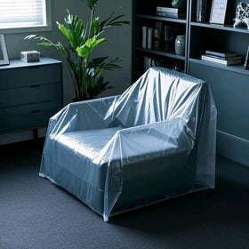 TopSoon clear chair cover on an armchair protects upholstery from dust