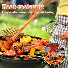 Topulors BBQ mop in use on chicken for even glaze application