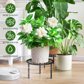 TOSKING plant stand in living room with lush greenery.