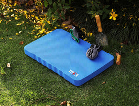 TOUA kneeling pad in yoga/workout scene for knee support