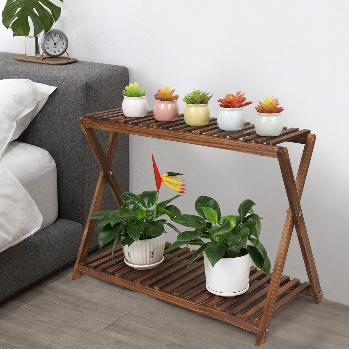 Hollow shelves of the Tovacu stand promote airflow