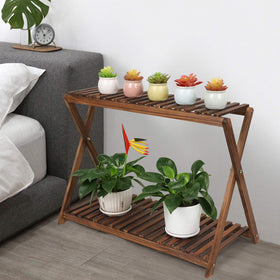 Hollow shelves of the Tovacu stand promote airflow