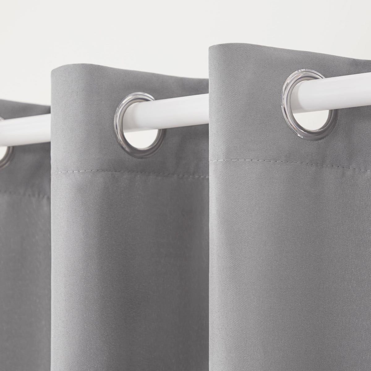 Town & Country Basics Cabana curtains on outdoor window with light control