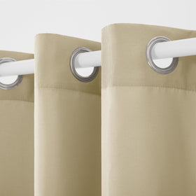 Town & Country Basics Cabana Solid Grommet-Top Curtain with eight stainless steel grommets for easy hanging.