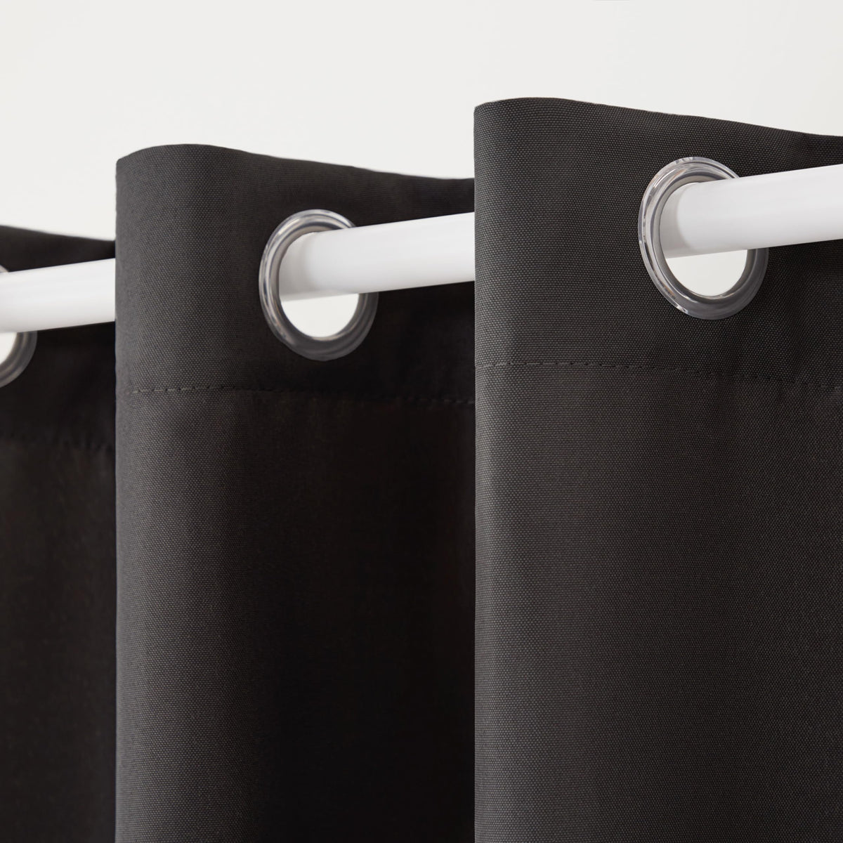 Town and Country Cabana grommets close-up show rust-proof hardware