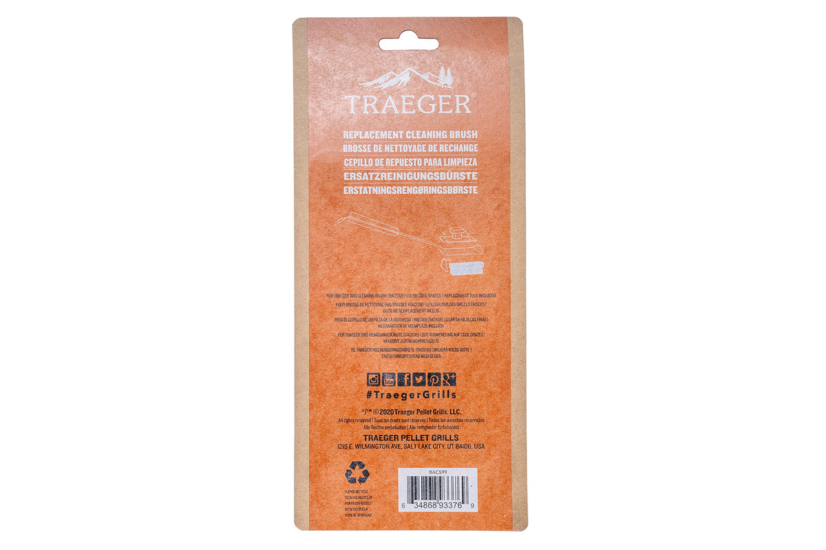 Traeger BAC599 replacement brush head pack on a grill, easy to swap during cleaning.