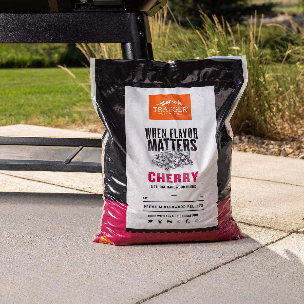 Traeger Cherry pellets on grill delivering balanced burn for even cooking and rich smoke