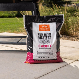 Traeger Cherry pellets on grill delivering balanced burn for even cooking and rich smoke