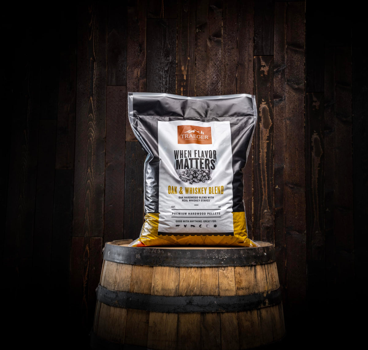 Traeger Oak & Whiskey Blend pellets on grill for smoky, robust results.