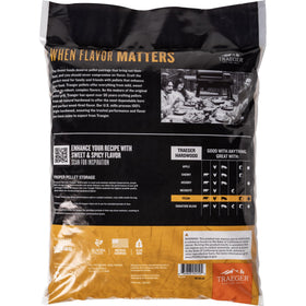 Traeger Pecan pellets being poured, illustrating easy handling and steady smoke.