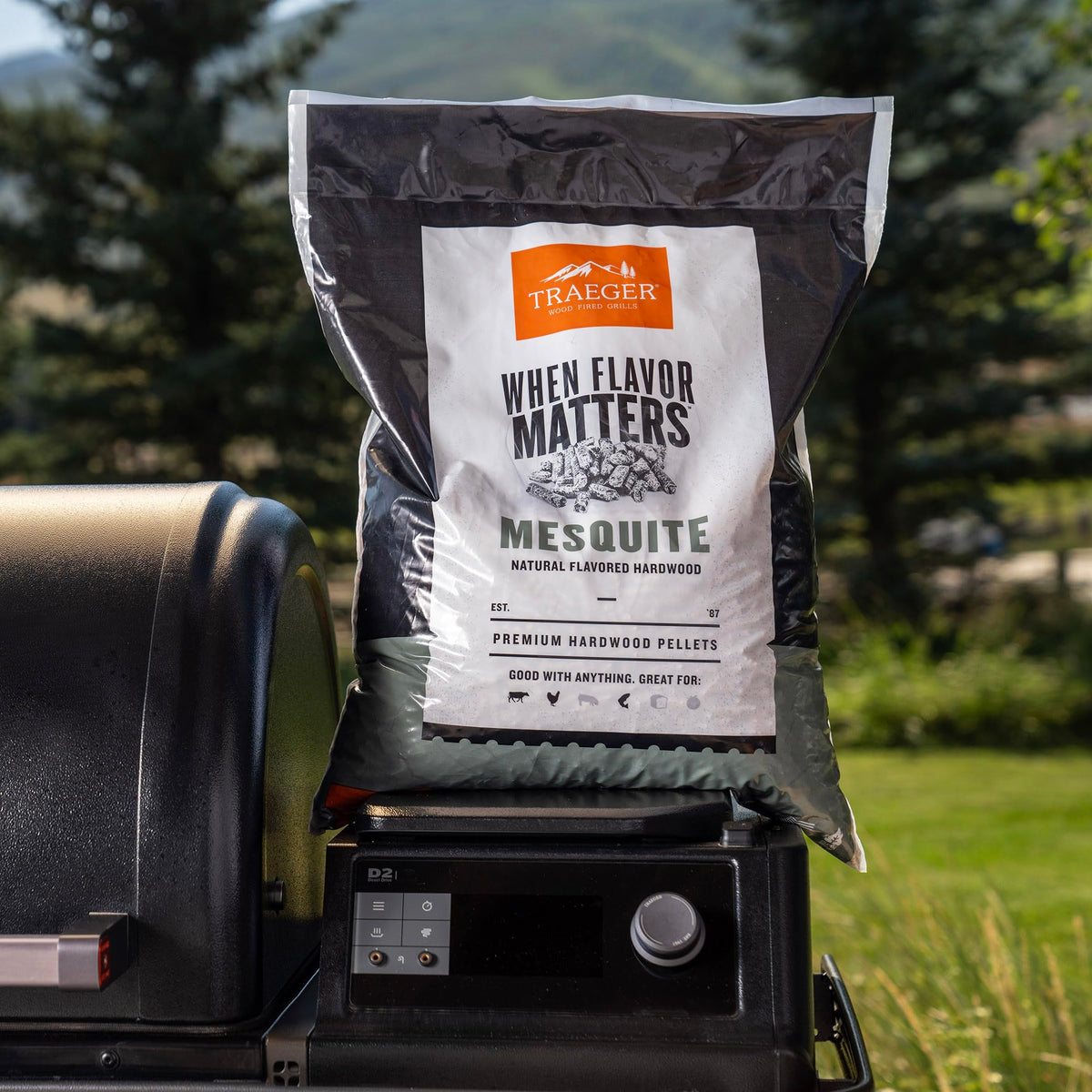 Beef being cooked with Mesquite pellets, highlighting bold flavor possibilities.