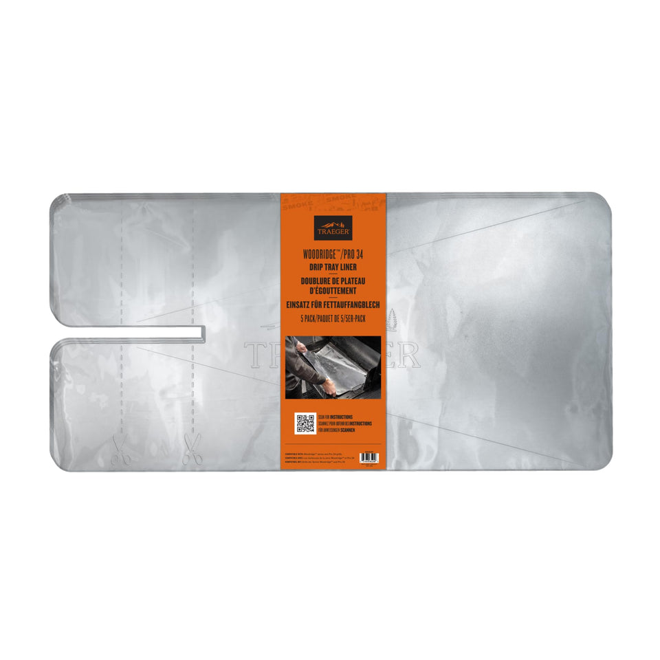 Traeger Pro 34 drip tray liner placed on grill for easy cleanup after cooking.