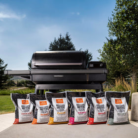 Pellets being poured into hopper hints at effortless smoke and flavor