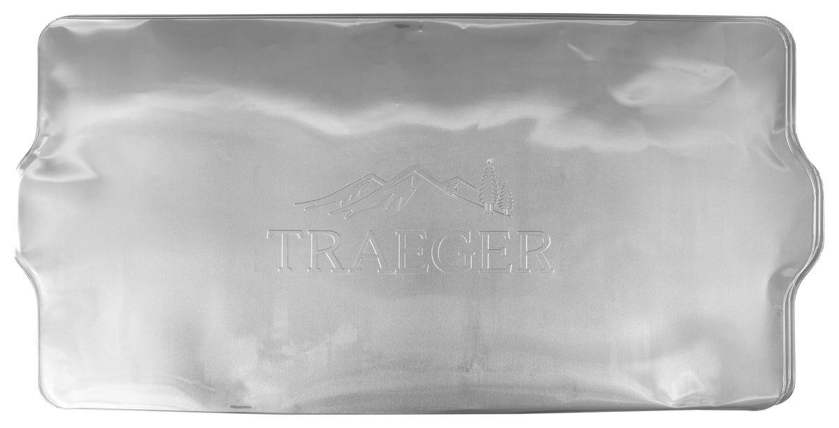Traeger Silverton 810 liner in use, protects grease and drips for a pristine grill.