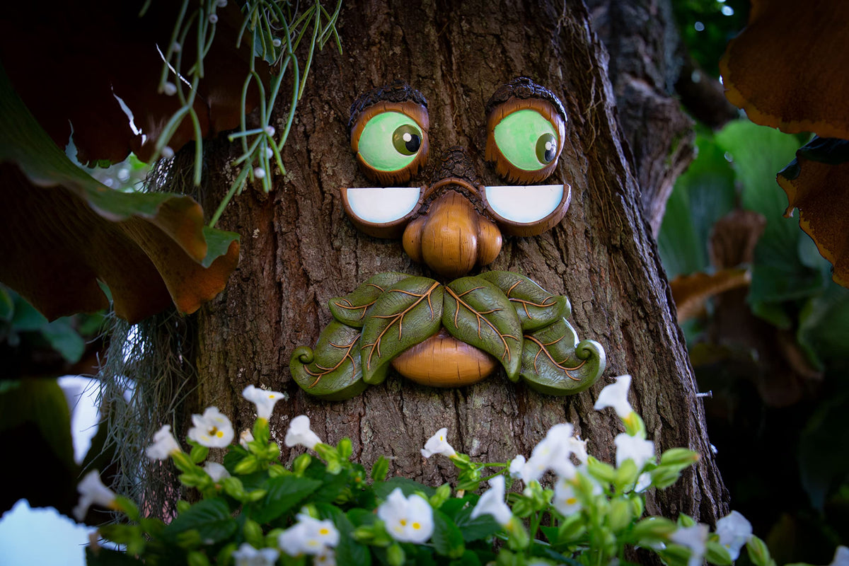 Tree Poetry weather-resistant tree face stands up to seasons.