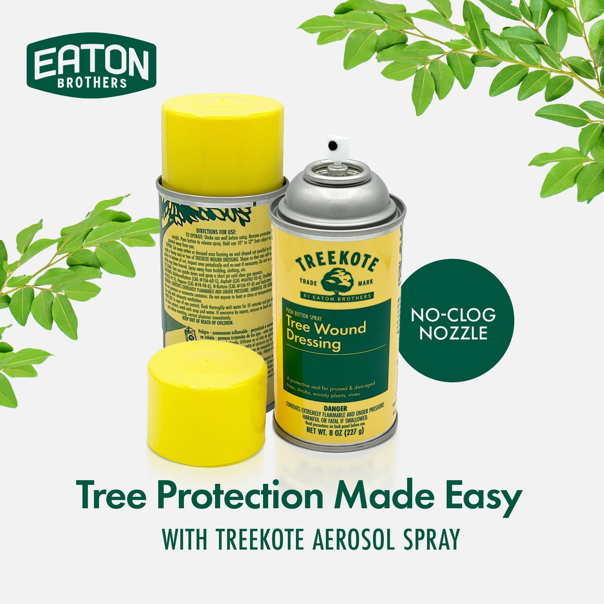 Treekote pruning sealer spray applying an even coat to damaged limbs.