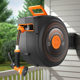 Treillage Tale hose reel in action with 100 ft hose for precise watering.