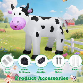 TRMESIA 6FT inflatable cow with built-in LED lights illuminated at night