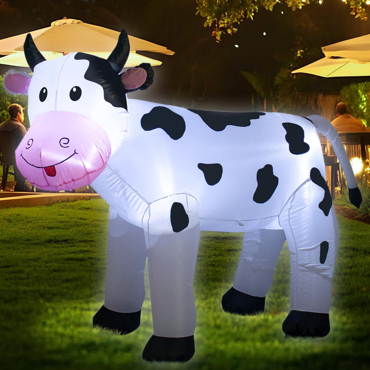 TRMESIA inflatable cow secured with stakes and ropes for stability