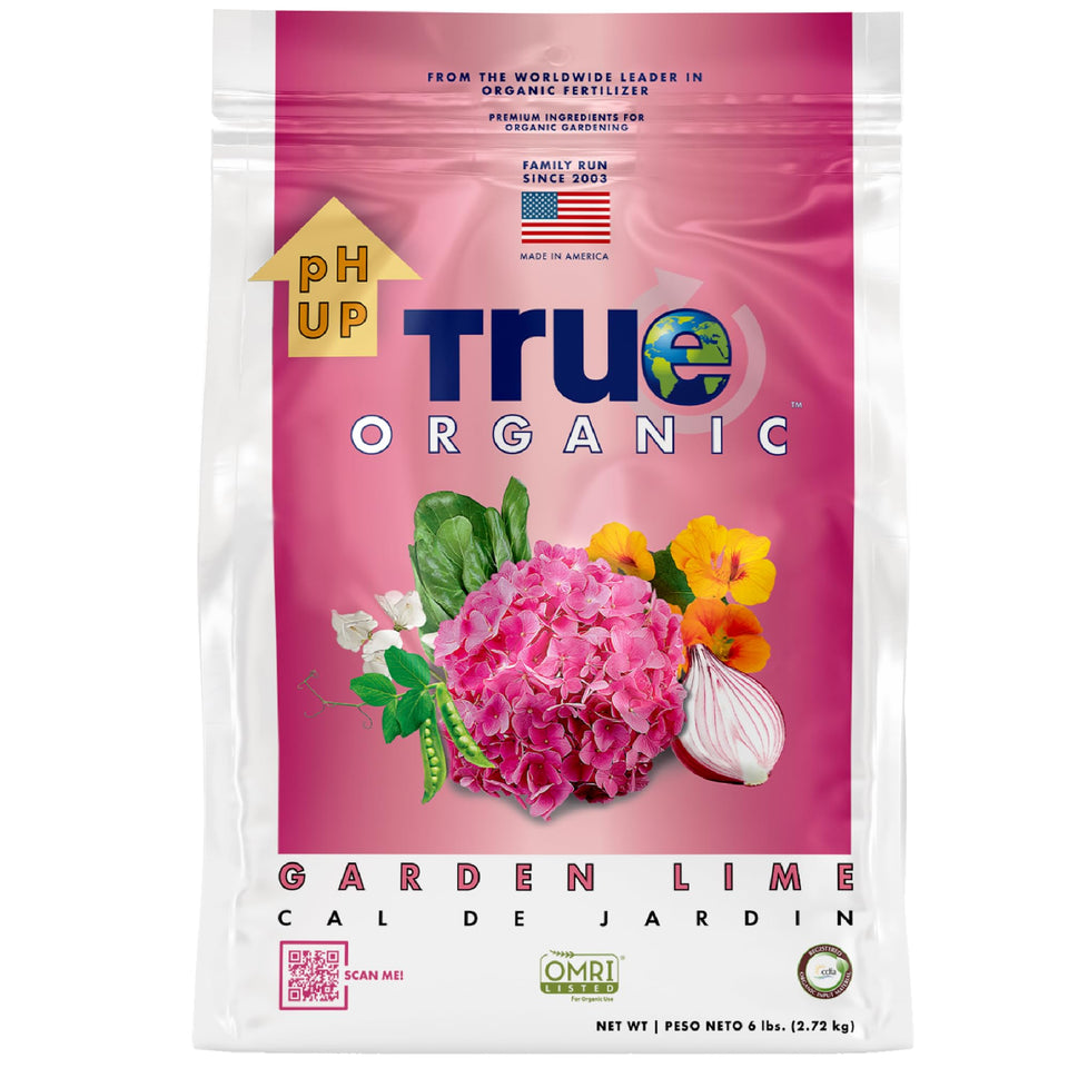 True Organic Garden Lime bag on soil ready to balance soil pH