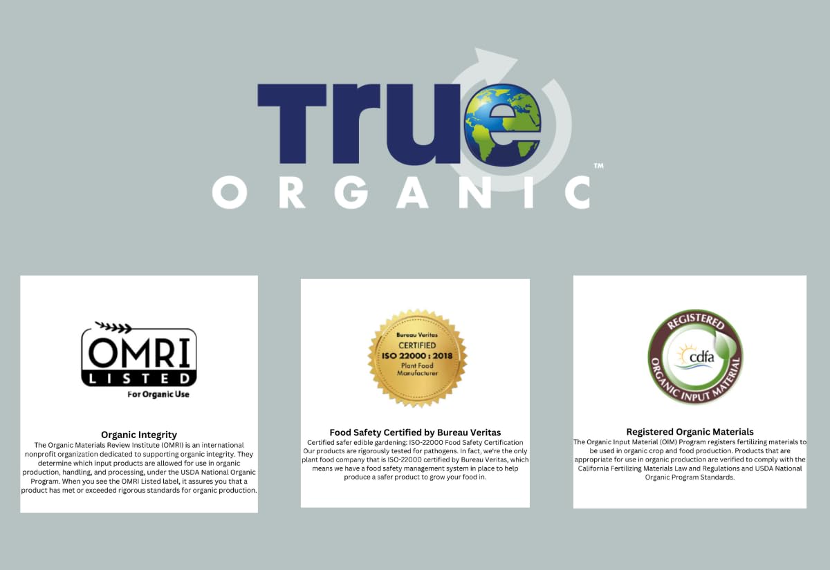 True Organic Liquid Tomato & Vegetable Food bottle-stand shows easy garden feeding setup.