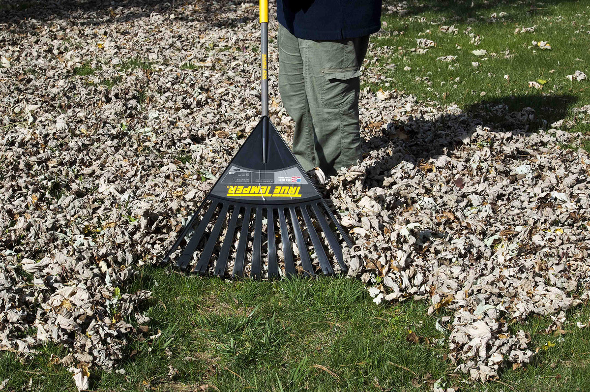 TRUE TEMPER cushioned-grip rake enables comfortable use during autumn leaf gathering