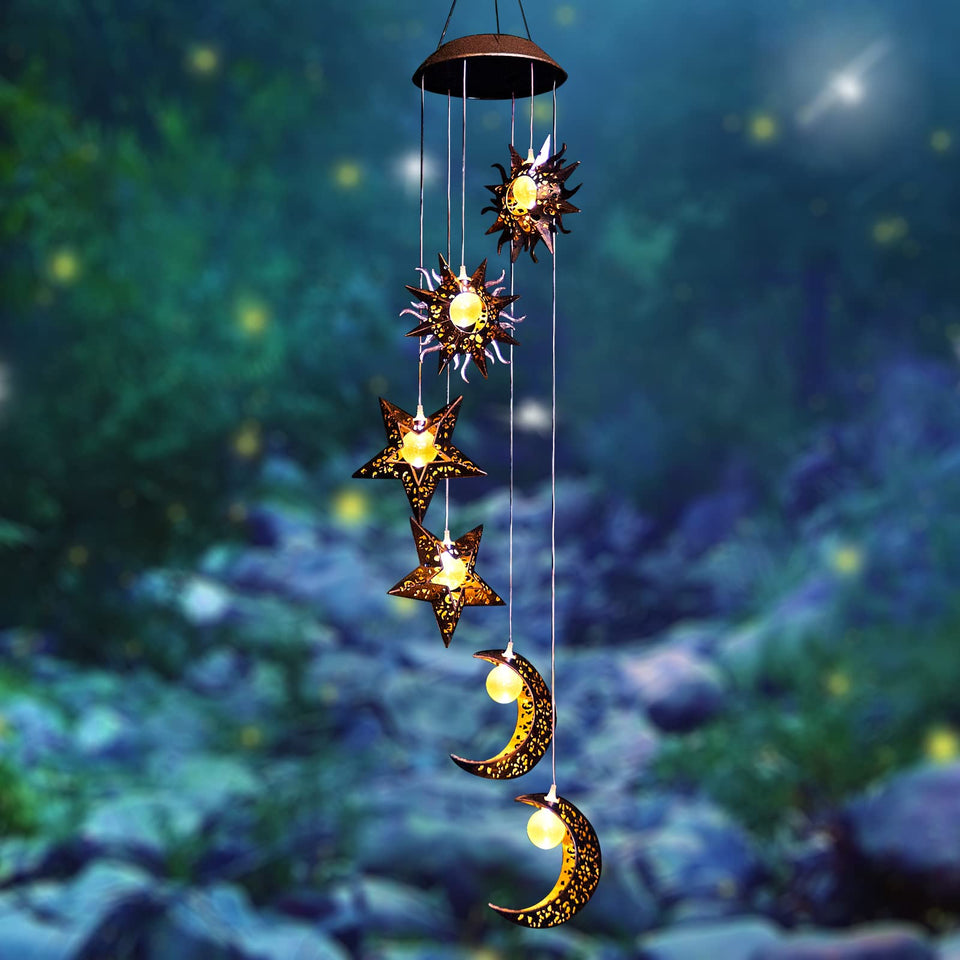 Tryme Solar Wind Chimes with sun-moon-star design for magical garden ambiance.