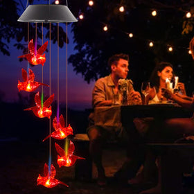 TSIPEKLO Cardinal solar wind chime enhances garden decor with gentle glow