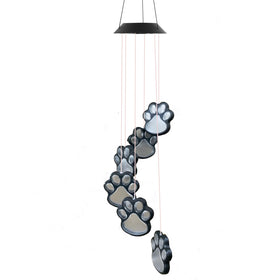 TSIPEKLO night-light paw-print wind chime creates ambiance.