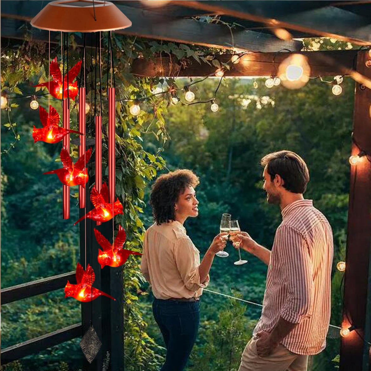 TSIPEKLO Solar powered wind chimes glow with warm red cardinals.