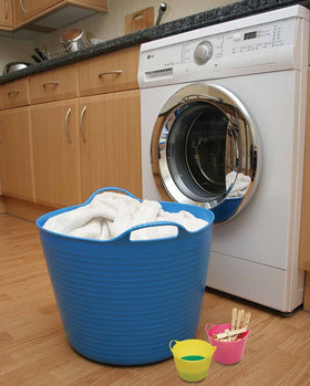 Tubtrugs Green Gorilla tub used for laundry chores with strong handles.
