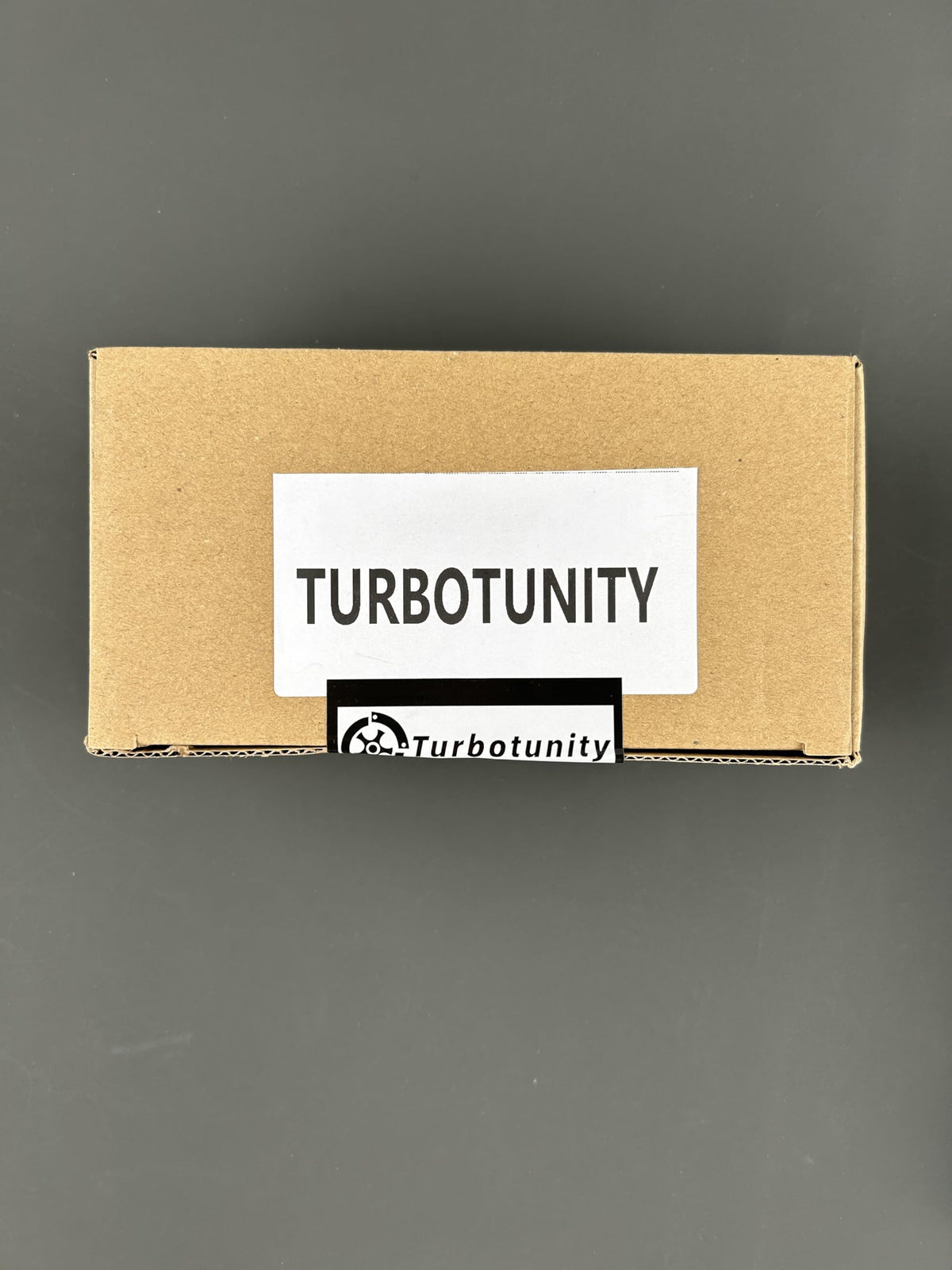 TURBOTUNITY generator carburetor kit compatibility label showing model range.