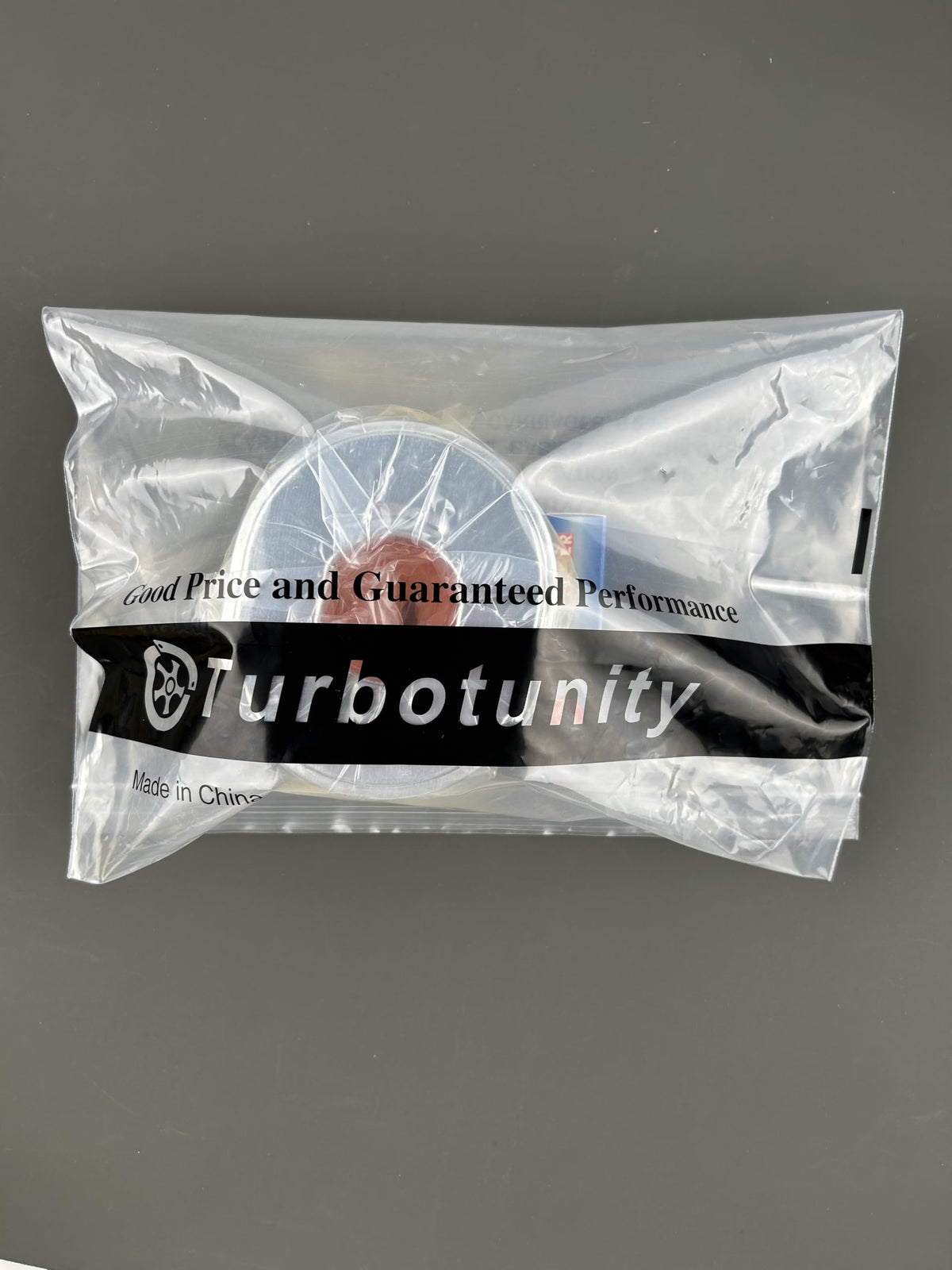 Turbotunity air filter ready for lawn mower setup.