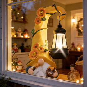 Twinbling garden decor gnome with lantern offers versatile display options