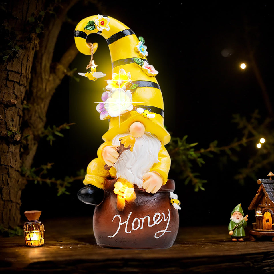 Twinbling garden gnome 13-inch with LED bees and flowers adds whimsical charm to outdoor spaces.