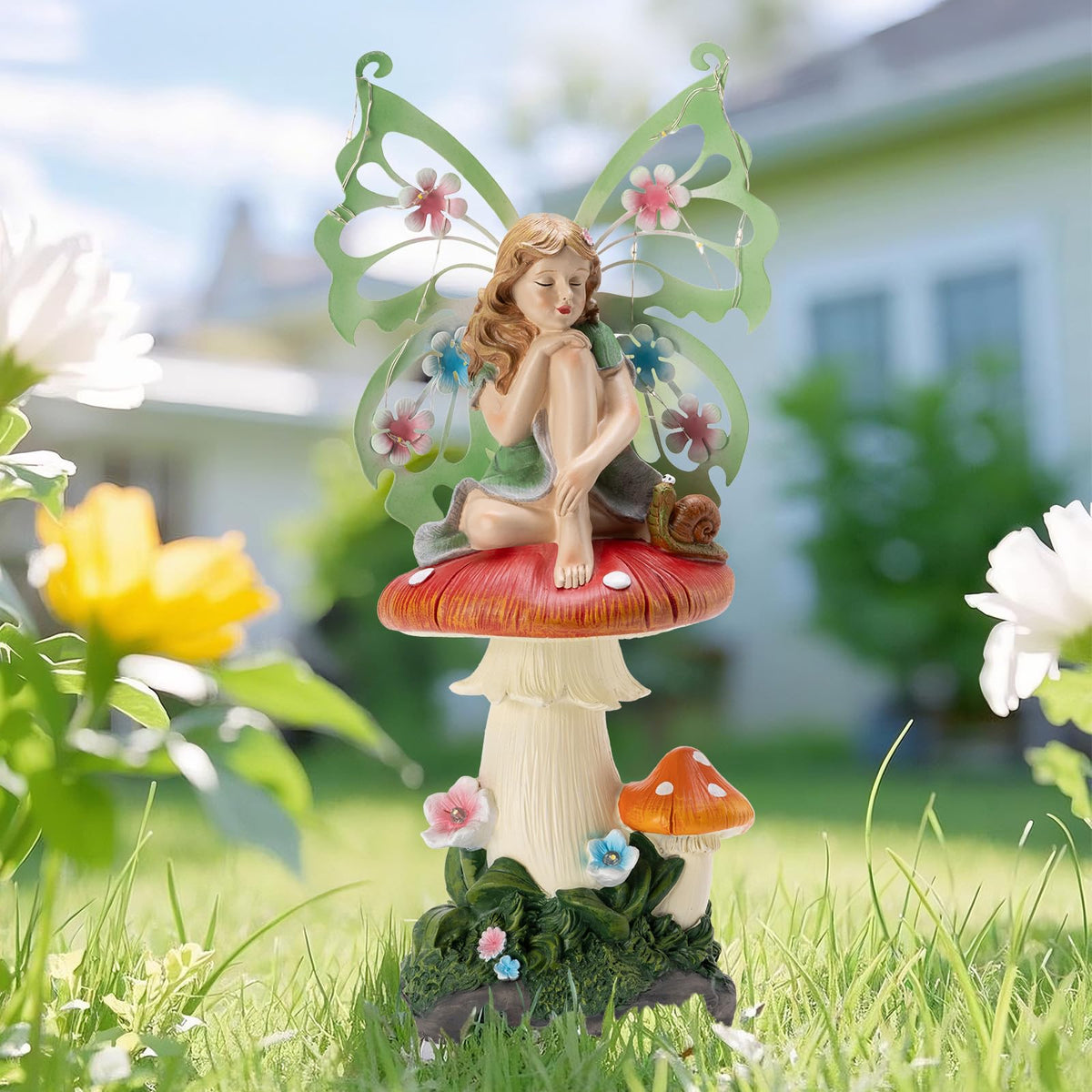 Twinbling hand-painted fairy adds color to porches and lawns.